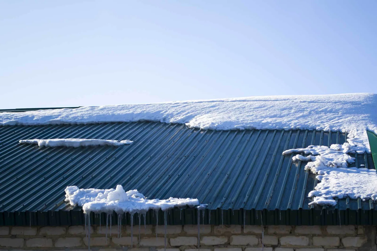 Commercial Snow and Ice Roof Damage Repair in Aurora, IL